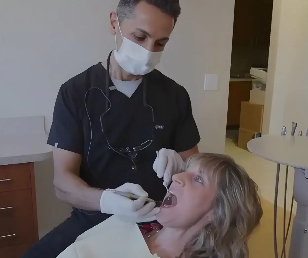 Dr. Aria Irvani treating a patient at Foothill Ranch Dentistry